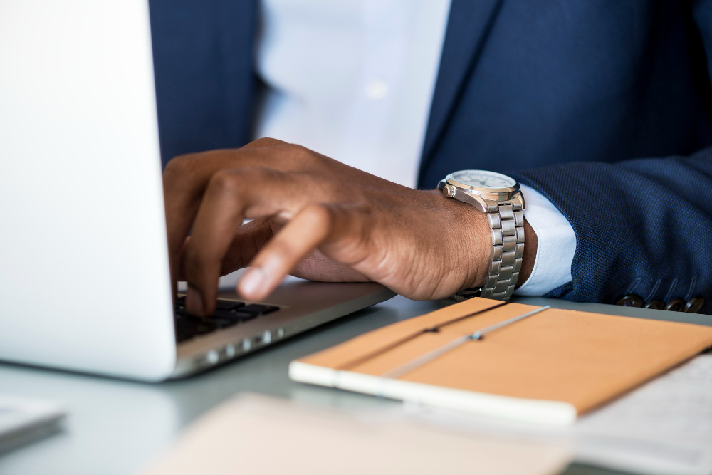 black-businessman-using-computer-laptop